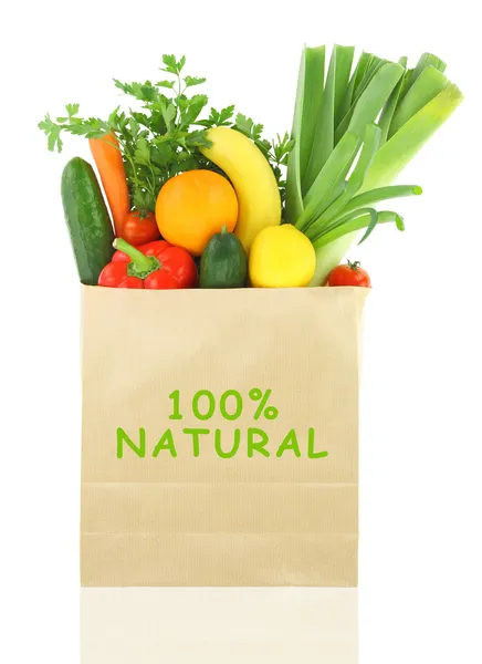 100% Natural en una bolsa llena de verduras y frutas —  Fotos de Stock