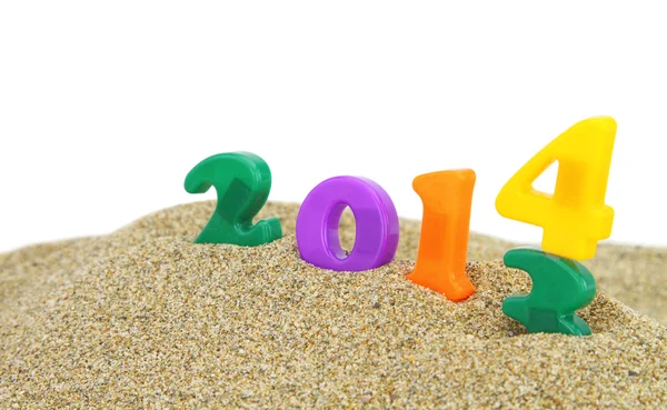 Ano novo multicolorido 2014 na areia — Fotografia de Stock