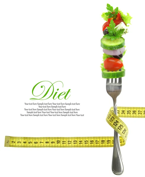 taze karışık sebze üzerinde ölçüm bandı ile çatal