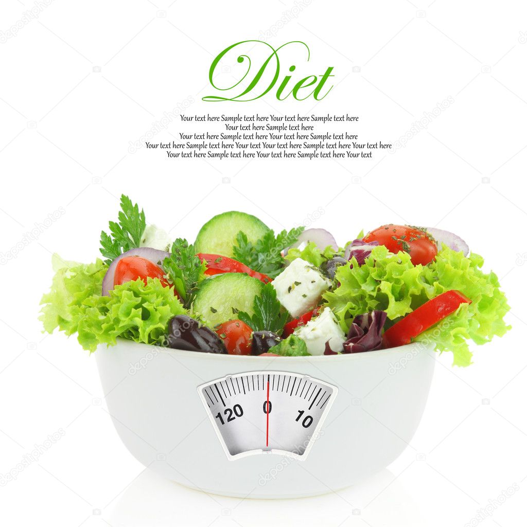 Diet meal. Vegetables salad in a bowl with weight scale