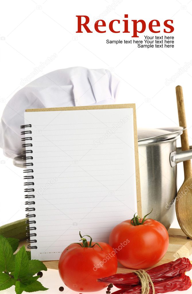 Blank recipe book and vegetables