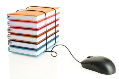 Stack of books connecting to a computer mouse clipart