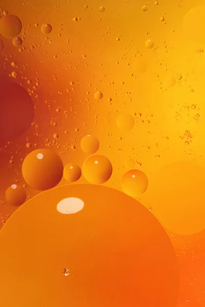 Abstract orange background with bubbles in the water — Stock Photo, Image