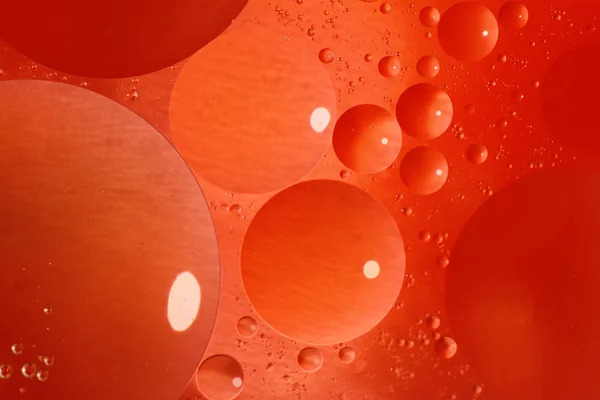 Abstract red background with bubbles in the water — Stock Photo, Image