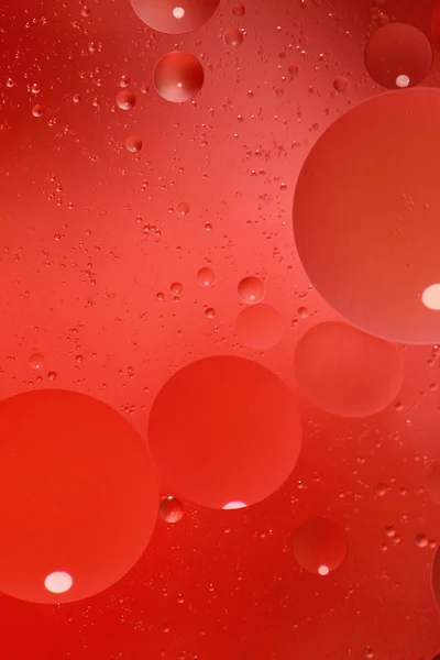 Fundo vermelho abstrato com bolhas na água — Fotografia de Stock