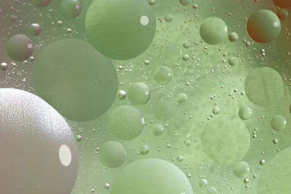 Abstract green background with bubbles in the water — Stock Photo, Image