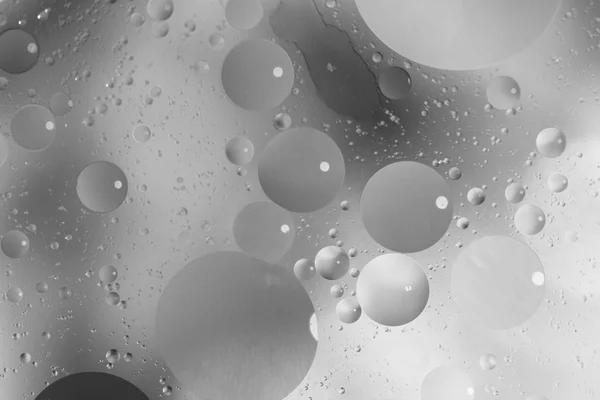 Fundo cinza abstrato com bolhas na água — Fotografia de Stock