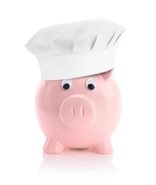 Cooking economy represented by a piggy bank with a chef hat — Stock Photo, Image