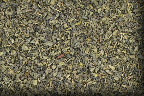 Закрыть сухой зеленый чай — стоковое фото