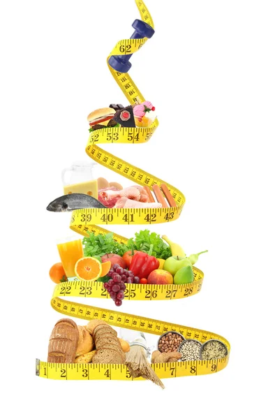 Food pyramid with measure tape — Stock Photo, Image