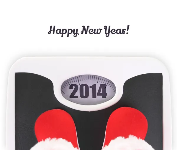 Santa' s boots on bathroom scale — Stock Photo, Image