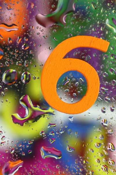 Number six on abstract colorful drops background — Stock Photo, Image