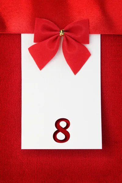 Número oito no cartão vermelho — Fotografia de Stock