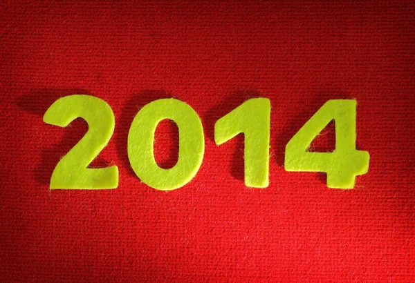 2014 new year on red wool background — Stock Photo, Image