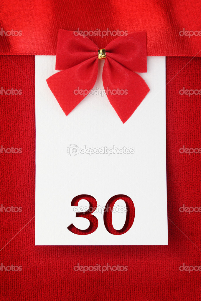 Number thirty on red greeting card