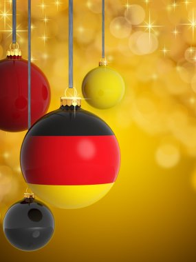 Noel topları ile ışık arka plan önünde Alman bayrağı