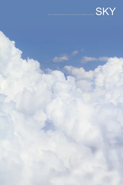 Blue sky with fluffy clouds, air shot. — Stock Photo, Image