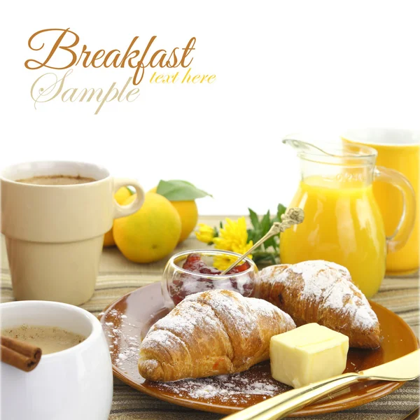 Breakfast with croissants and beverages — Stock Photo, Image