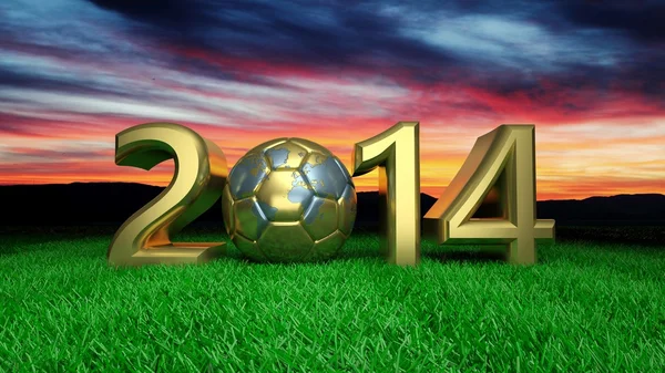 Or 2014 avec ballon de soccer or sur herbe — Photo