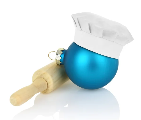 Christmas ball with chef hat and rolling pin — Stock Photo, Image