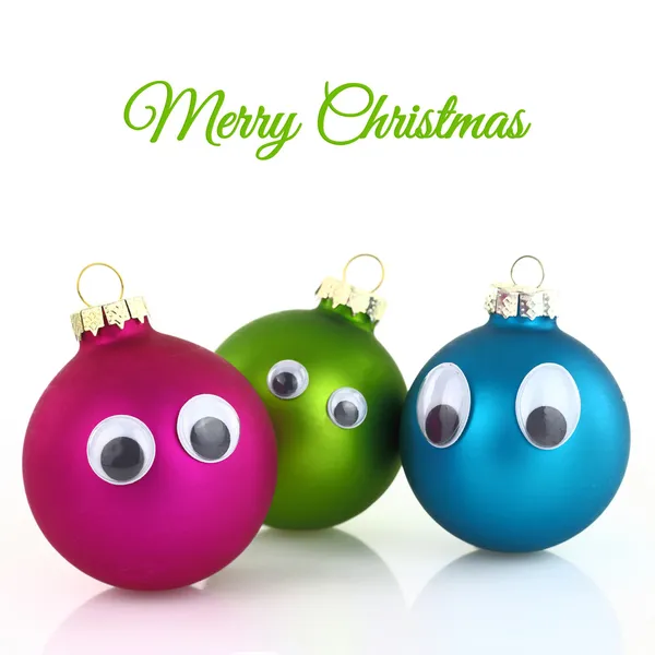 Cute Christmas balls with eyes isolated on white — Stock Photo, Image