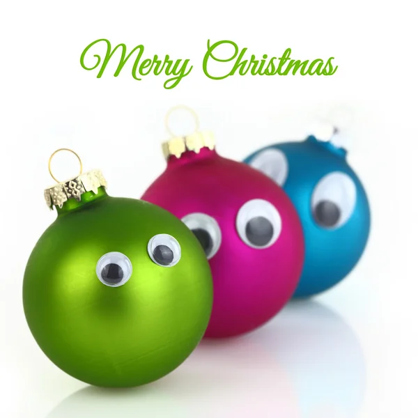 Cute Christmas balls with eyes isolated on white — Stock Photo, Image