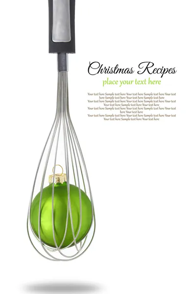 Cooking beater with Christmas ball — Stock Photo, Image