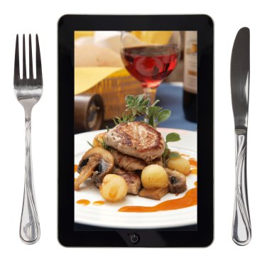 tablet yiyecek fotoğraf, çatal ve bıçak, kavramsal