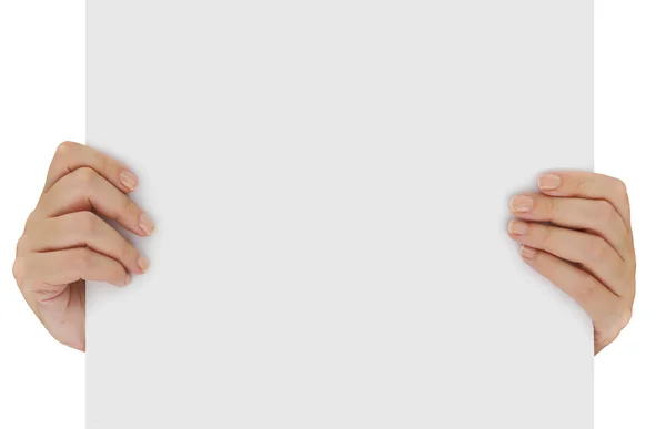 Hände halten leeres weißes Papier isoliert über weißes — Stockfoto