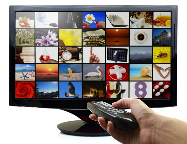 Smart tv with photos and hand holding remote control — Stock Photo, Image