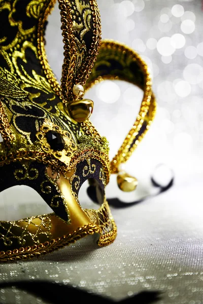 Vintage venetian carnival mask with glittering background — Stock Photo, Image