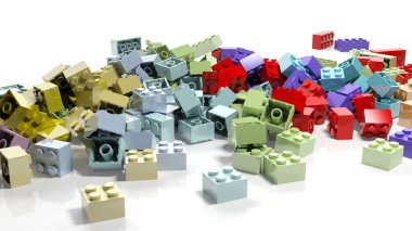 Beyaz arka plan üzerinde izole lego blokları yığını 