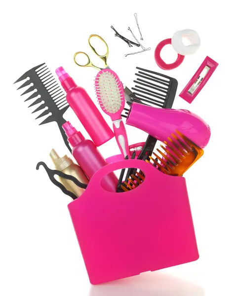 Various hairstyling equipment in shopping bag isolated on white — Stock Photo, Image