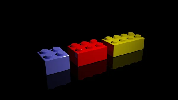 Tres bloques de lego aislados sobre fondo negro — Foto de Stock