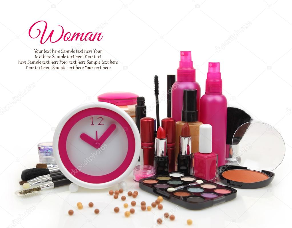 Pink clock with various cosmetics isolated on white background 