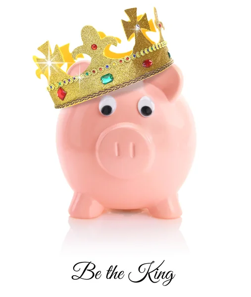 Piggy bank wearing a golden crown — Stock Photo, Image
