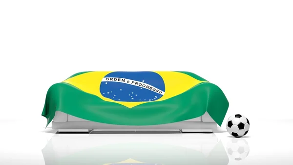 Sofa covered with Brazilian flag and classic soccer ball — Stock Photo, Image