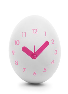 Pink clock dial on white egg isolated on white  clipart