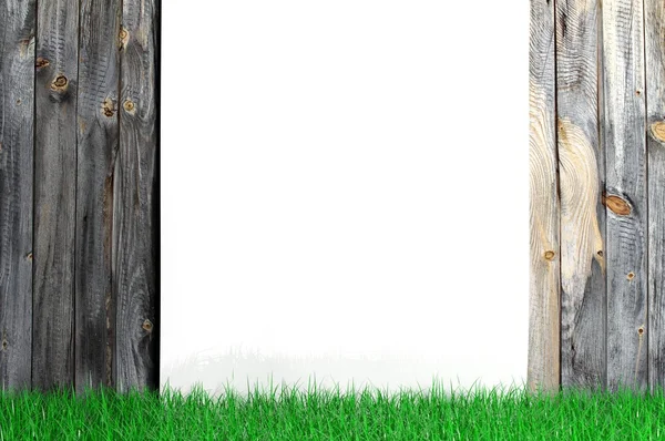 Witte leeg frame met gras op houten achtergrond — Stockfoto