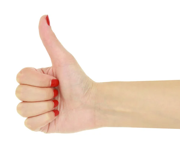 Pollice sulla mano femminile con chiodi rossi isolati — Foto Stock