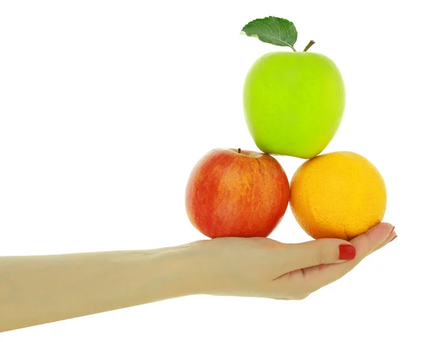Kvinnlig hand med färska färgglada frukter isolerad på vit — Stockfoto