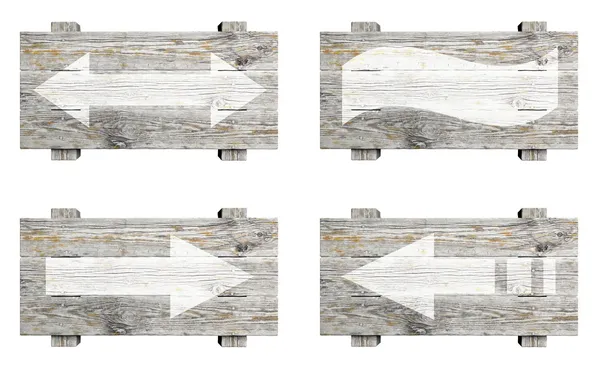 Vecchi cartelli in legno con frecce isolate su bianco — Foto Stock