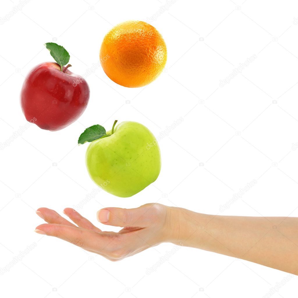 Female hand with fresh colorful fruits isolated on white