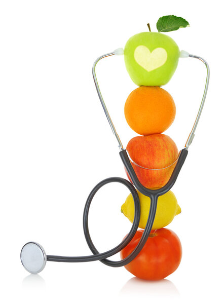 Stethoscope with fresh fruits isolated on white 