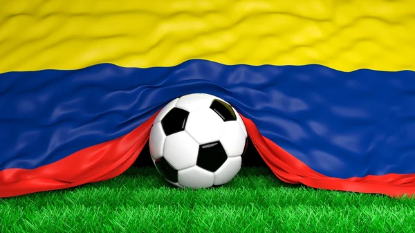 Soccer ball with Colombian flag on football field closeup — Stock Photo, Image