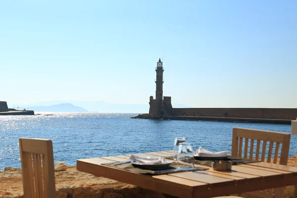 Ancient lighthouse, Chania Crete, view from restaurant — Stock Photo, Image