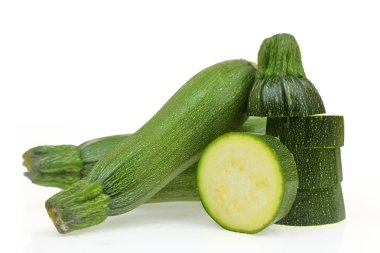Fresh green zucchinis isolated on white background clipart