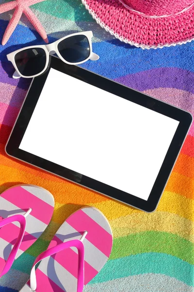 Tablet with blank screen on beach towel with accessories — Stock Photo, Image