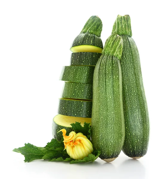 Fresh green zucchinis with flower and leaves isolated — Stock Photo, Image