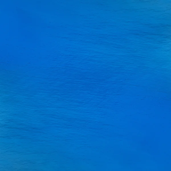 Djupblå ytan av vatten bakgrunden — Stockfoto